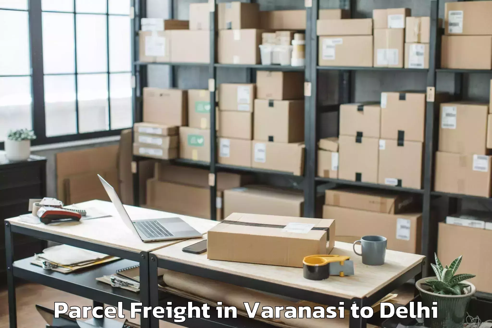 Top Varanasi to Garhi Parcel Freight Available